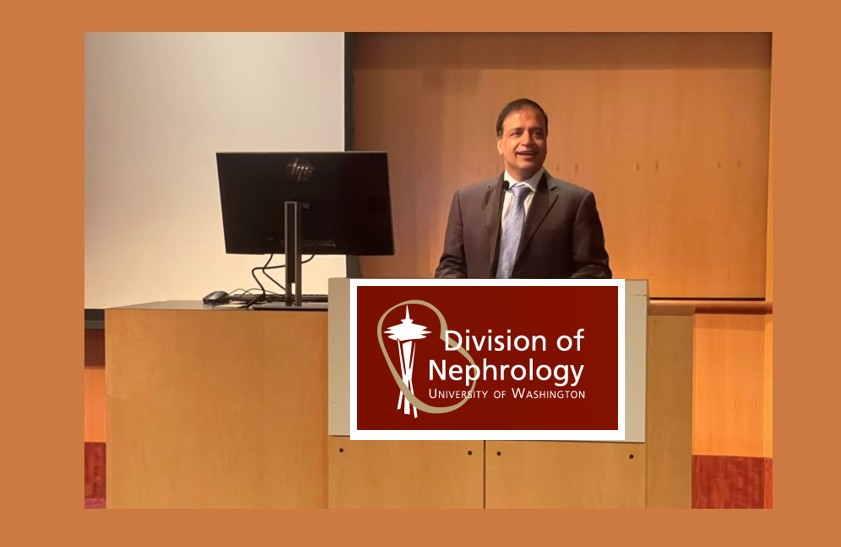 Rajnish Mehrotra, MD at podium
