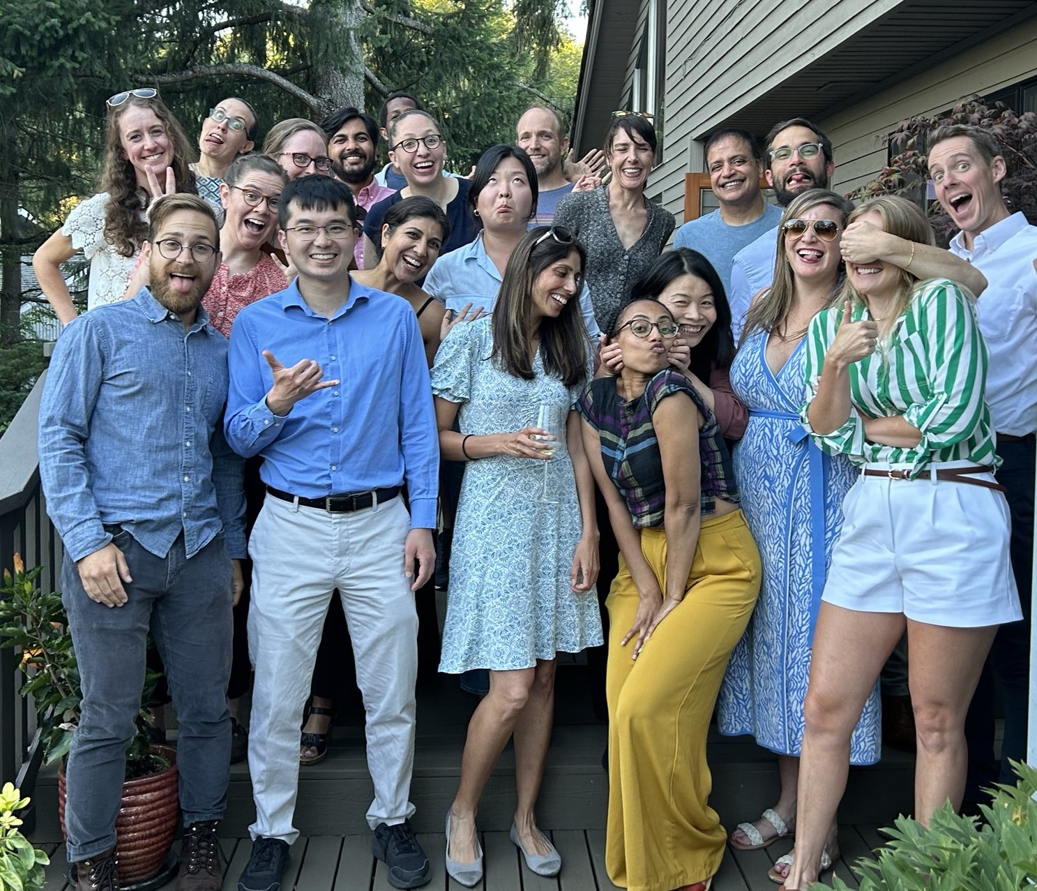 Group photo, fellows gather on porch