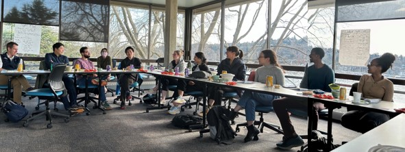Fellow at conference table, Retreat 2024